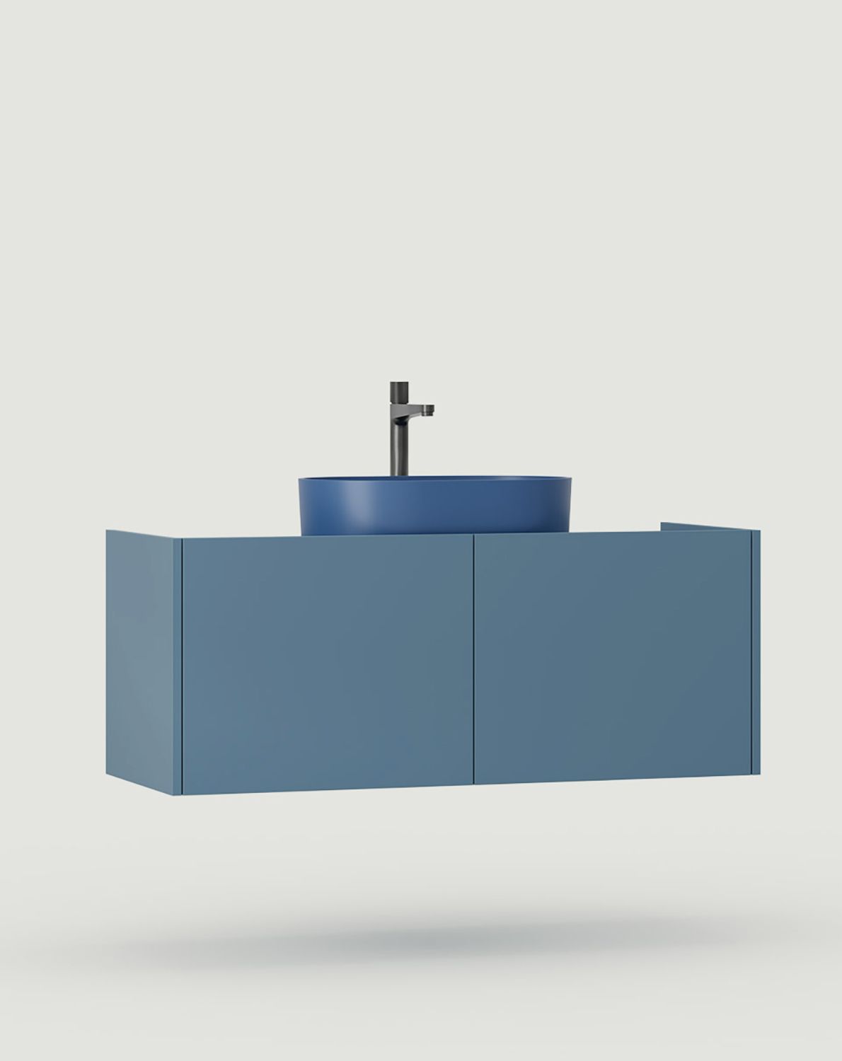 OMNIRES SKRA SKR63 armoire suspendue avec lavabo
Couleur : Matin brumeux
Vasque : OVO M+ Midnight Blue
Robinetterie : Tall Contour Anthracite Omnires